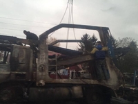 Які наслідки аварії: біля Рівного почали прибирати спалені машини та автовози (ФОТО) 