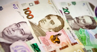 Оновлена 100-гривнева купюра: чи потрібно українцям міняти старі гроші