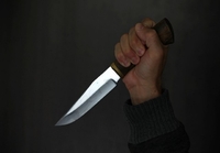 Житель Рівненського району напав на правоохоронця з ножем