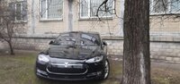 Кабель з вікна для Tesla більше не кинеш: мешканцям багатоповерхівок ввели сувору заборону 