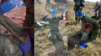 Громадянина Росії з синьо-жовтим прапором на голові роззброїли в зоні розмежування на Сході (ВІДЕО)