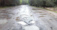 Як ремонтують дорогу до Білого озера на Рівненщині (ФОТО)