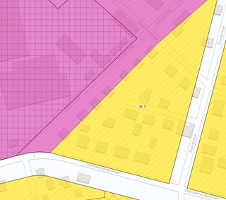 Зонінг. Рожевим позначена ділова зона, а жовтим - житлова. Як бачите, зони накладені нерівномірно. Однак це офіційний поділ