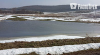Поле перетворилося на ставок: наслідки танення снігу у Рівненському районі (ФОТО)