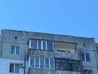 На даху 9-го поверху у Рівному застряг чоловік (ФОТО) 